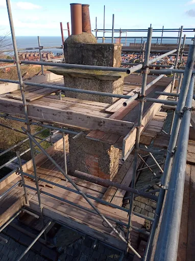 Chimney stack repair and maintenance work with sea views over Scarborough